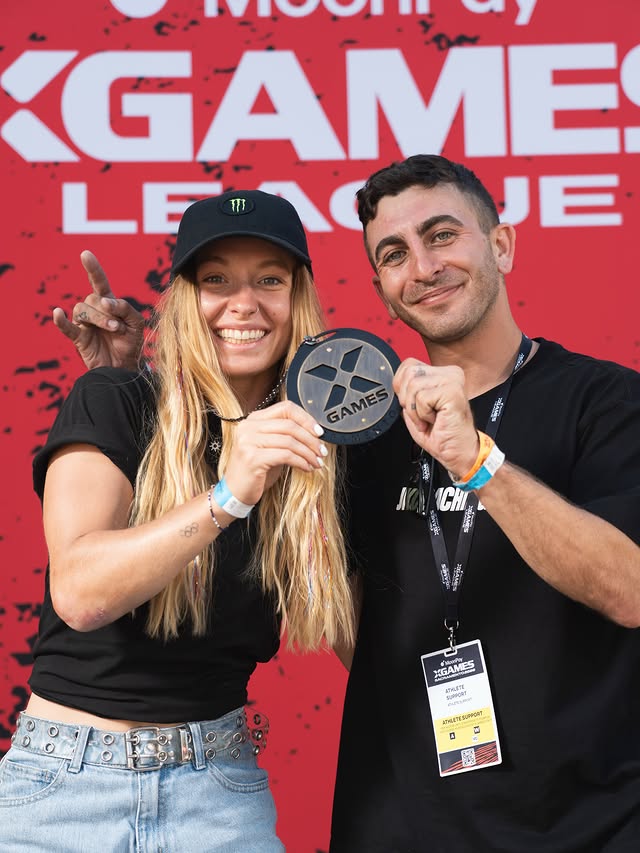 Josh celebrating an X Games result with an athlete